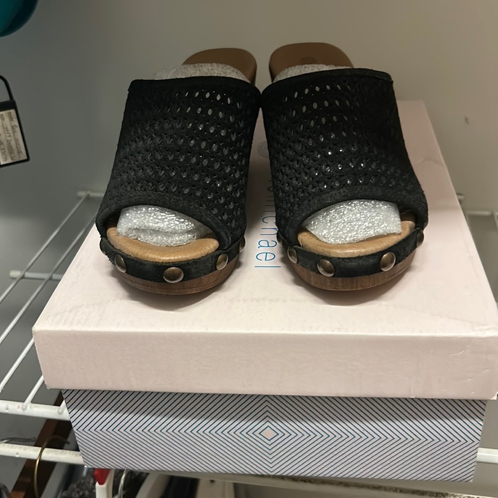 Black Eric Michael heals new in box.